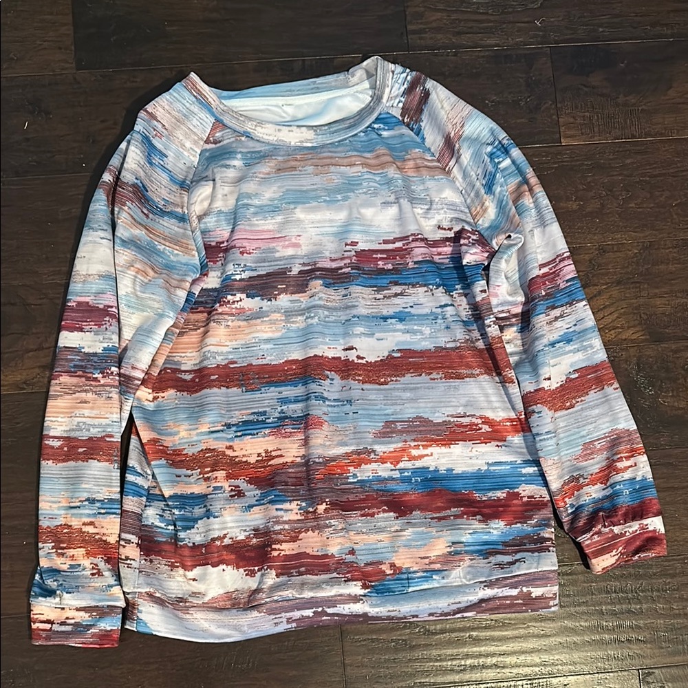 Blue and Red Artistic Sweatshirt with Abstract Pattern